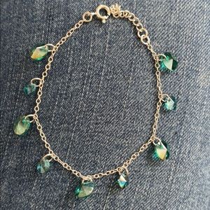 Silver bracelet with green stones
